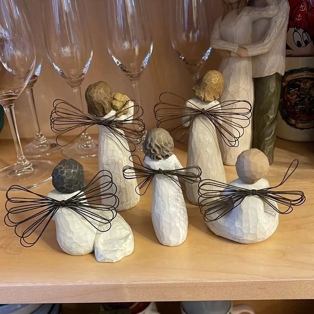 Willow Tree holds each animal