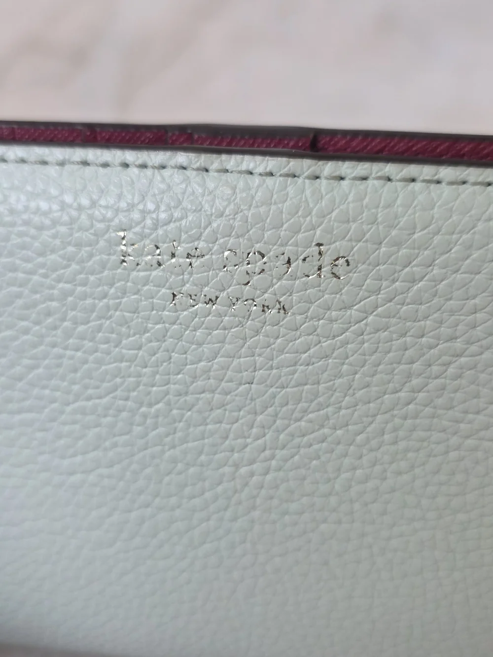 Kate Spade New York Staci Large Slim Bifold Wallet Mint Green Pebbled Leather