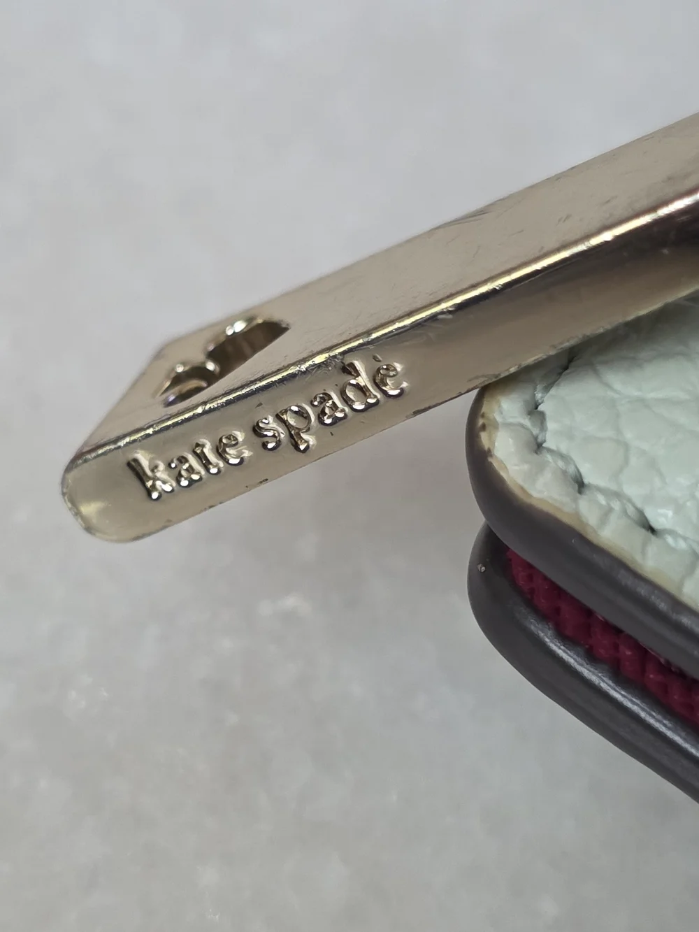 Kate Spade New York Staci Large Slim Bifold Wallet Mint Green Pebbled Leather