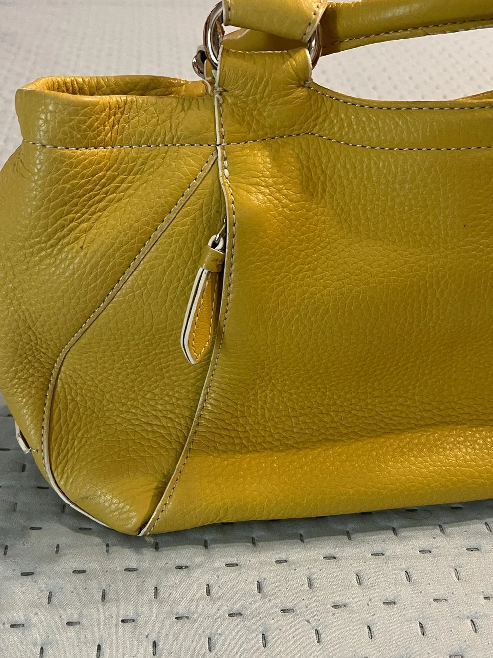 Cole Haan torn front pocket