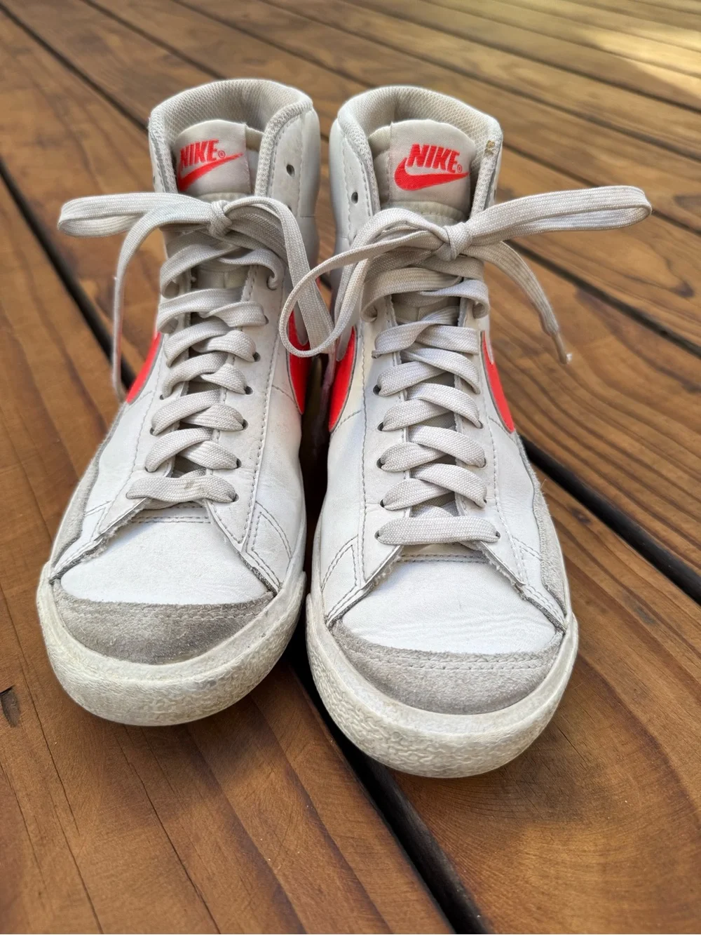 Nike High-Top Sneakers in Cream with Neon Orange Swoosh