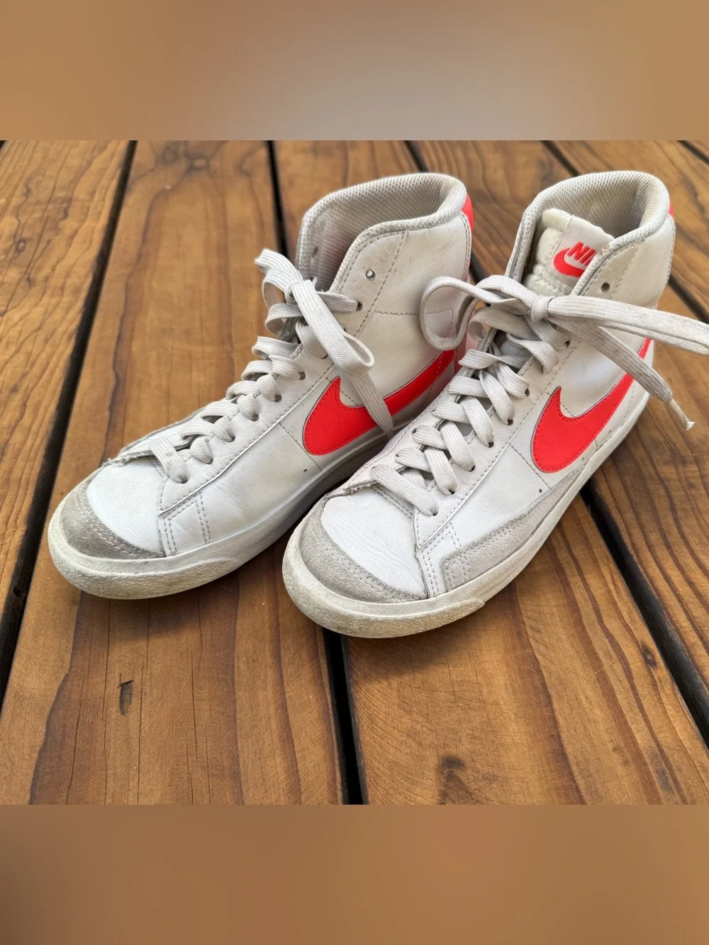 Nike High-Top Sneakers in Cream with Neon Orange Swoosh