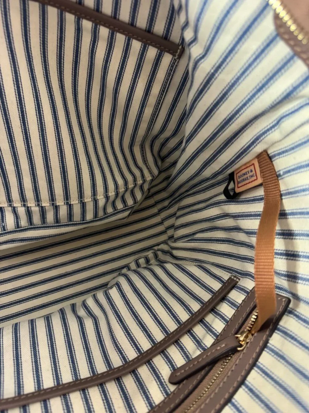 Dooney & Bourke gold lining