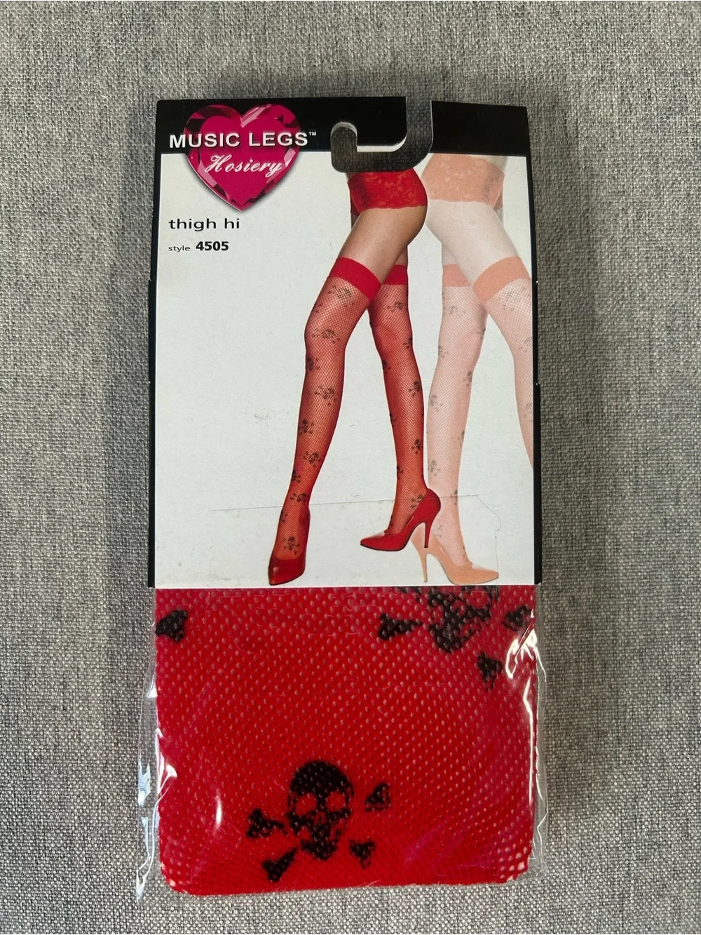Music Legs Red Fishnet Thigh-Highs with Black Skull Accents