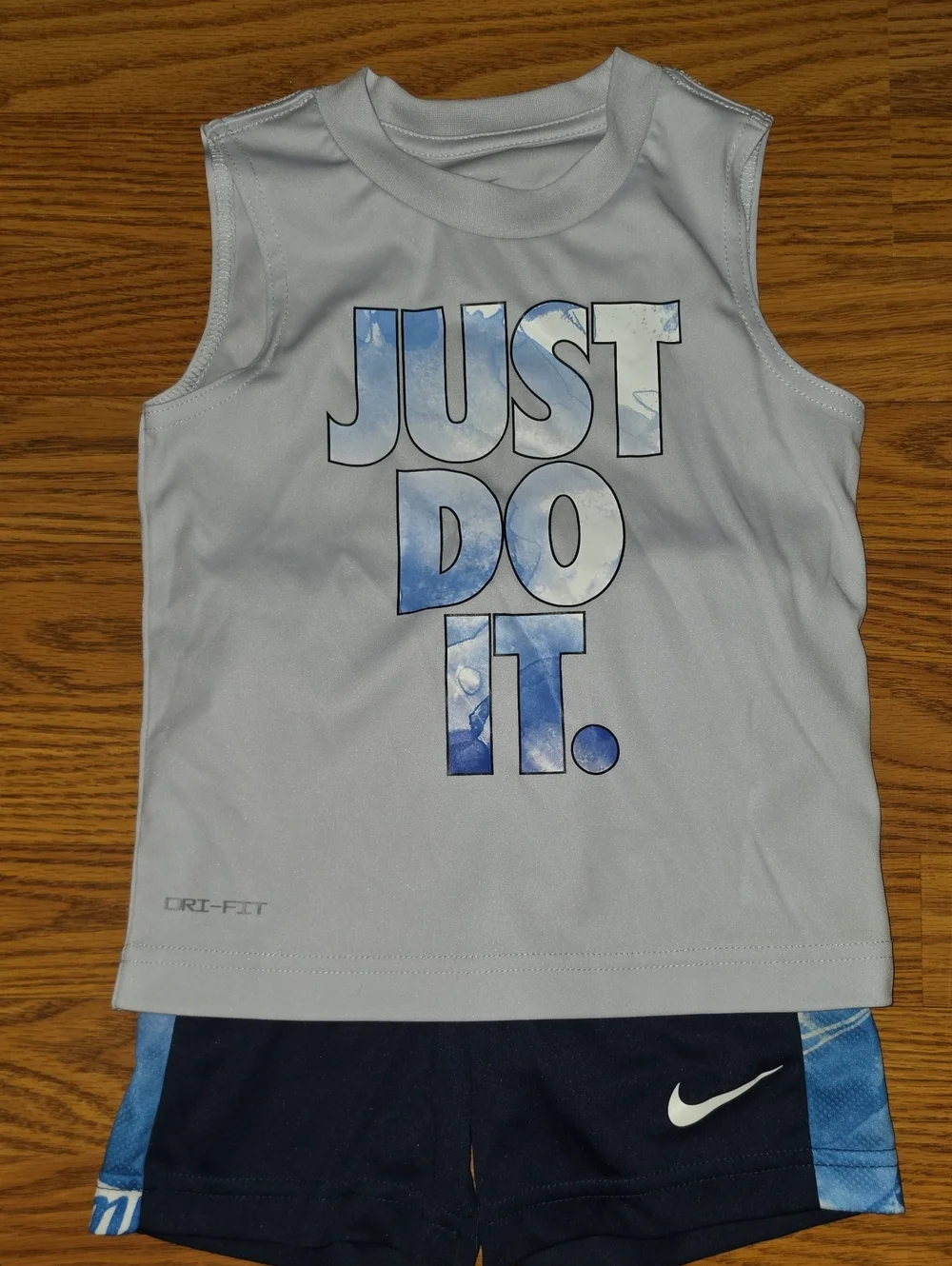 Nike White Tank Top with Blue 'JUST DO IT.' Graphic