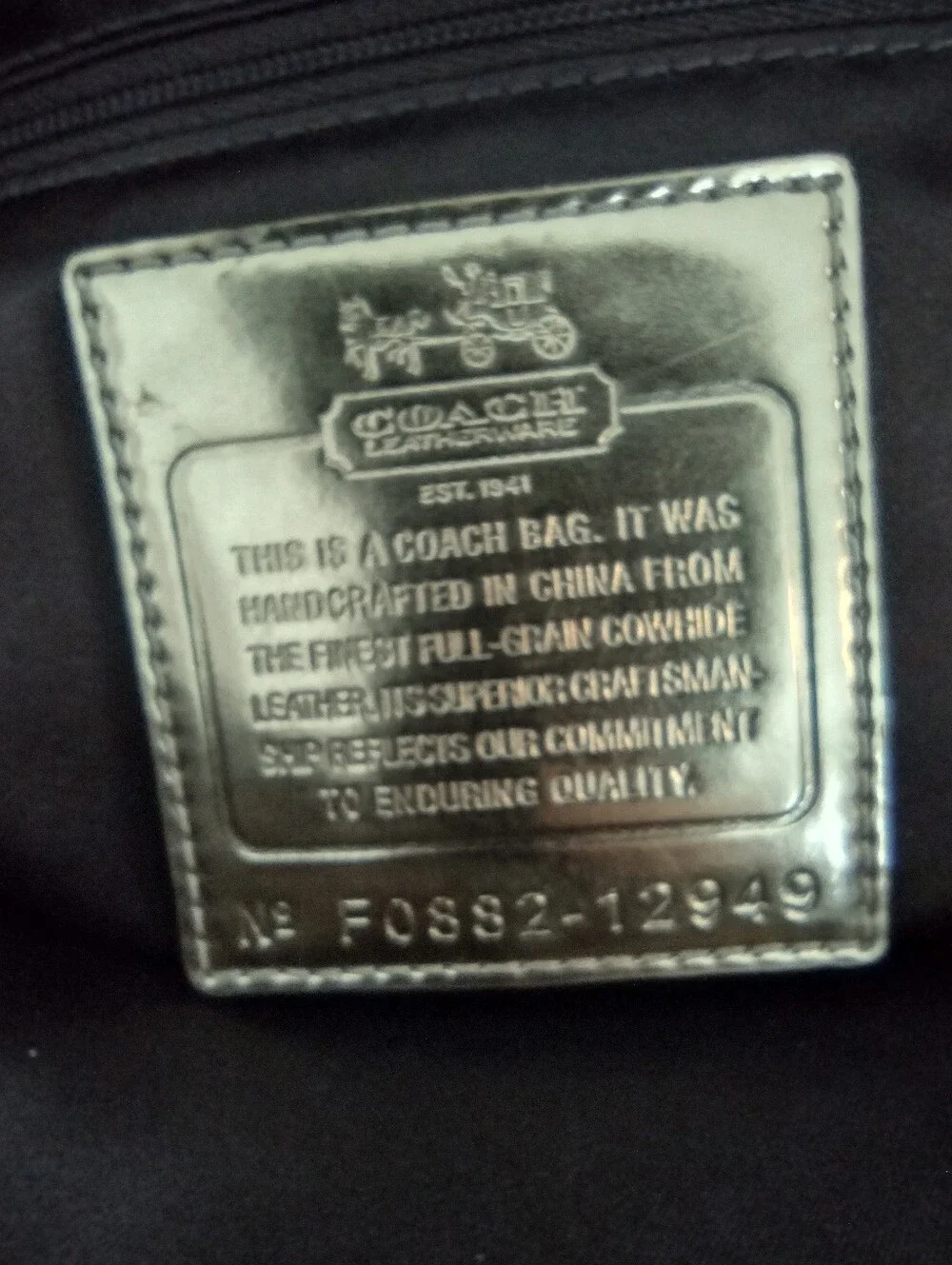 Coach comes wallet convertible