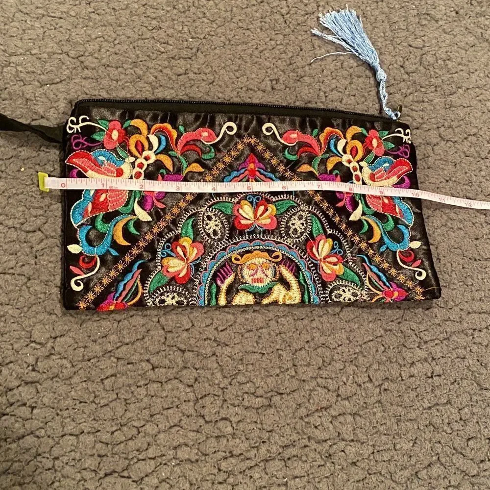 unbranded embroidered clutch