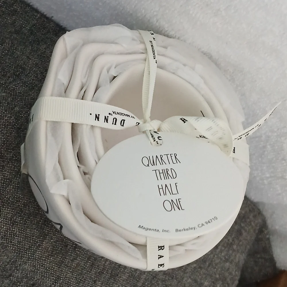 White matte ceramic measuring cups by Rae Dunn
