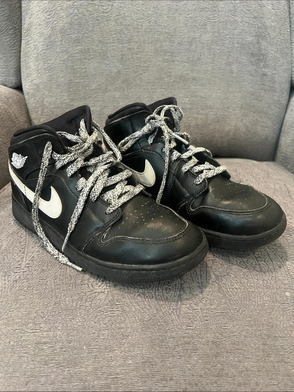 Nike Kids Black High-Top Sneakers with White Swoosh