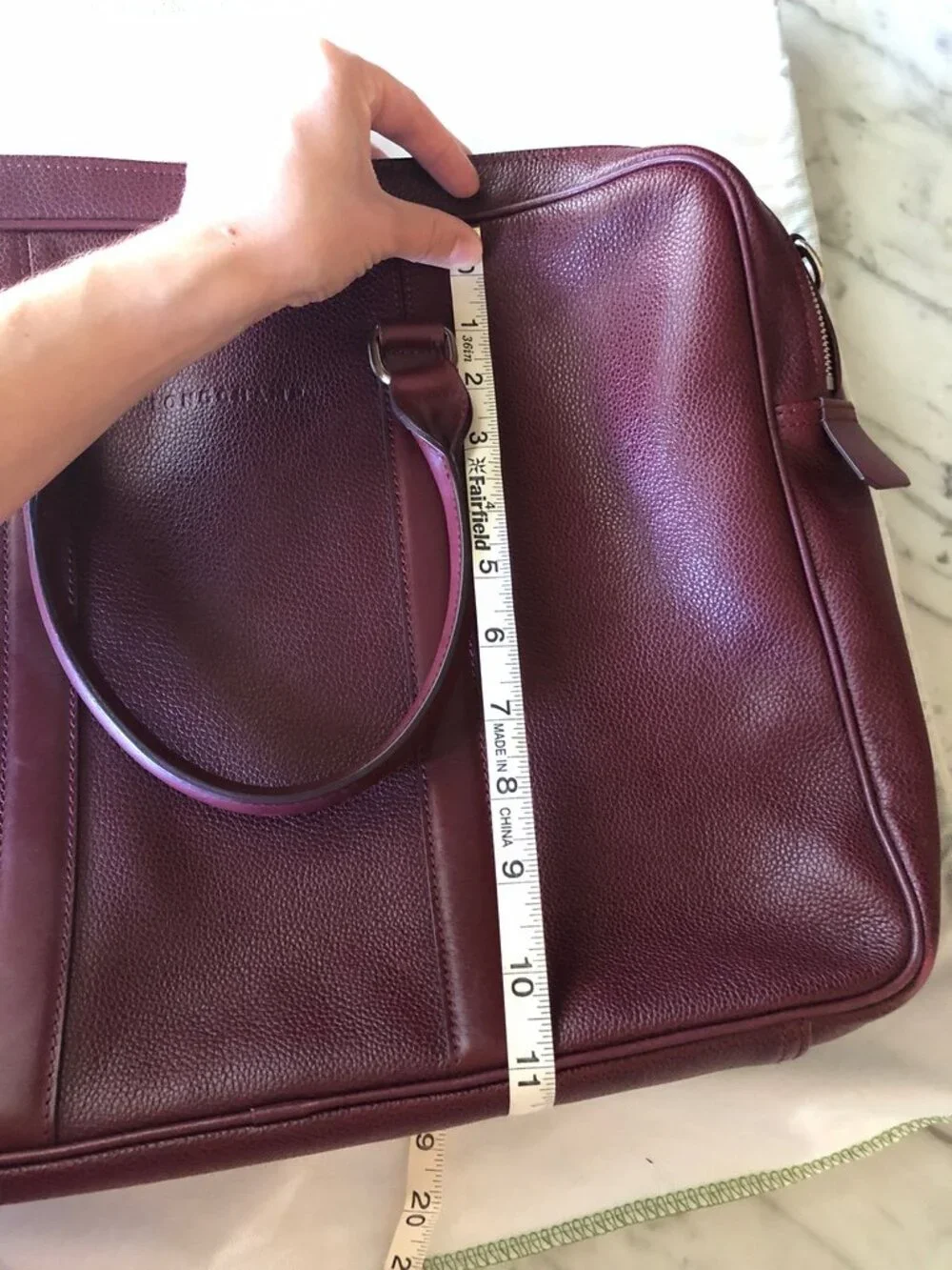 Longchamp Le Foulonné leather briefcase in a burgundy / deep red