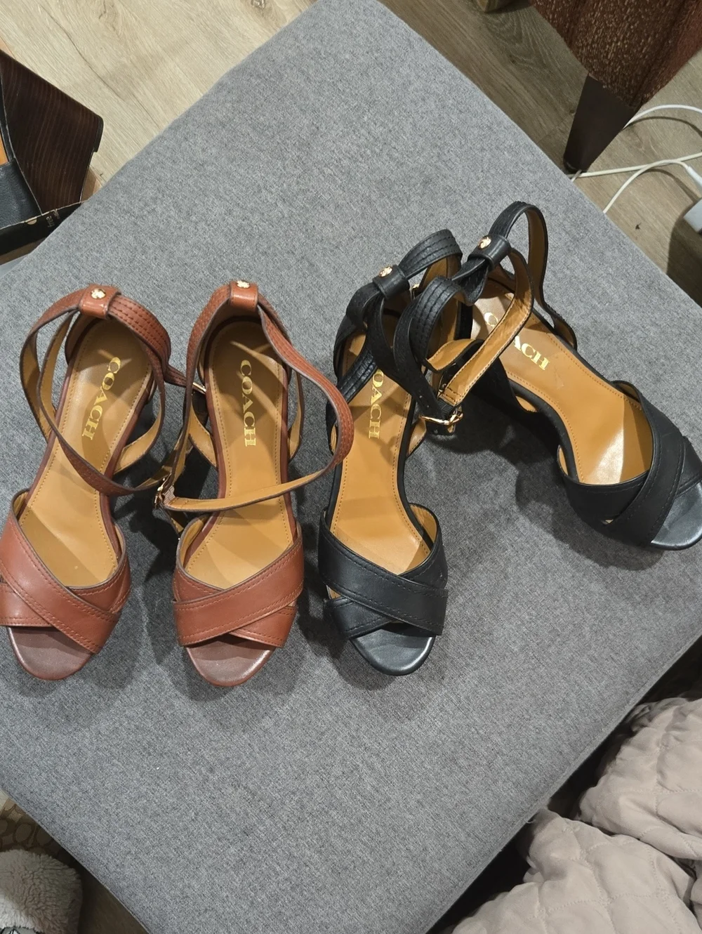 2 Pairs Of Coach Women's Leather Wedge Sandals in Black and Brown