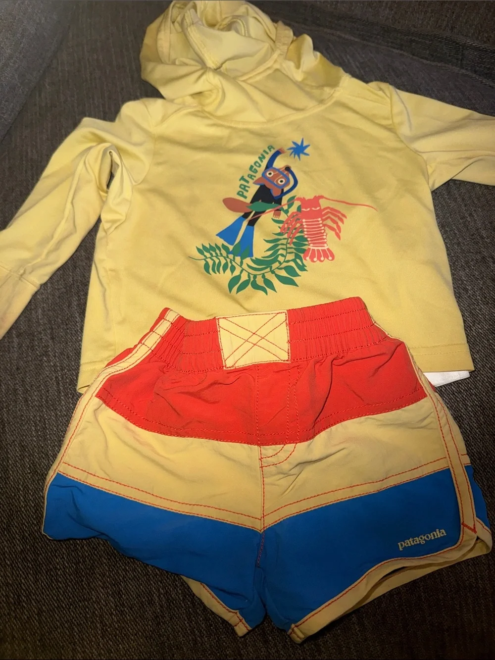 Patagonia Yellow Hoodie with Red, Blue & Yellow Colorblock Swim Shorts