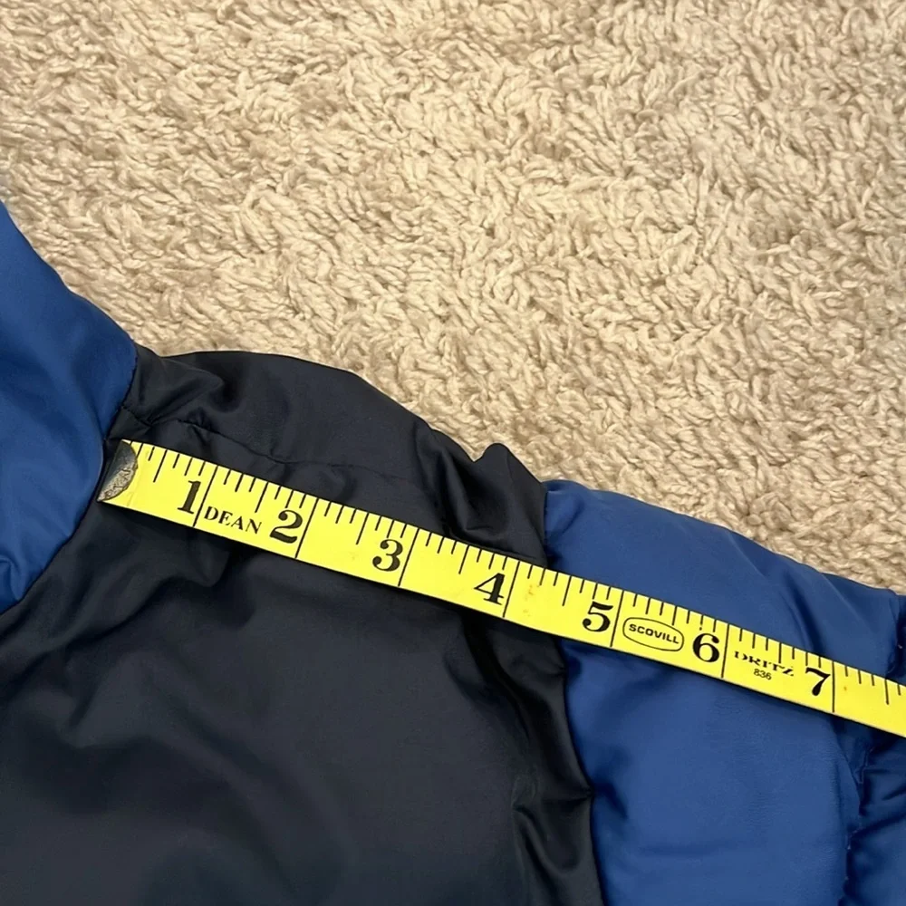 Old Navy SZ L10-12 navy/bla puffer. Zip front w/hood. Adjustable sleeve opening