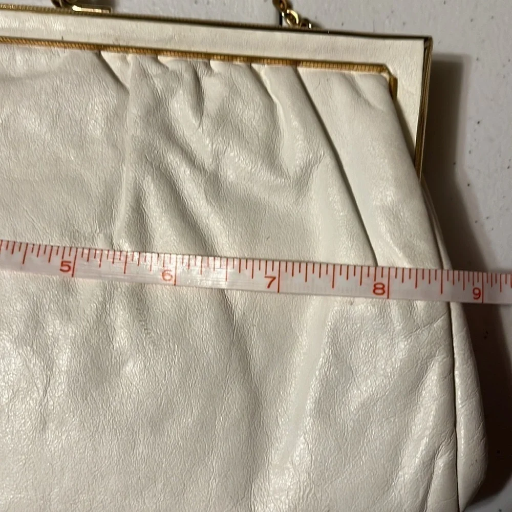 Etra White leather evening clutch.