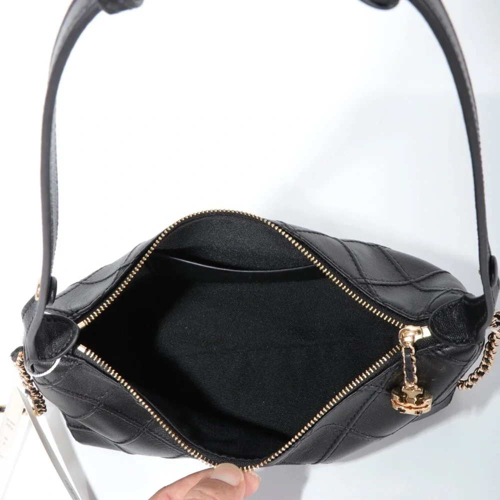 Tory Burch. subtle minimalist this