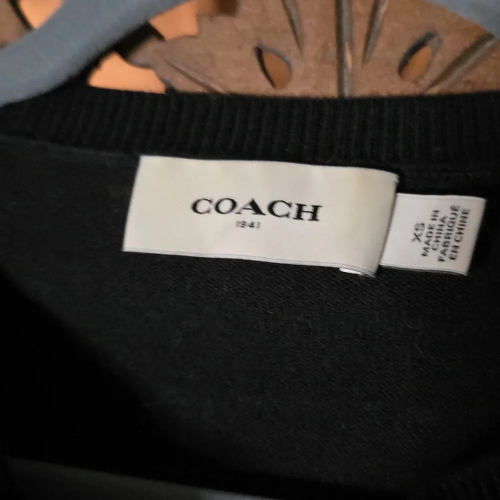 Coach sleek black