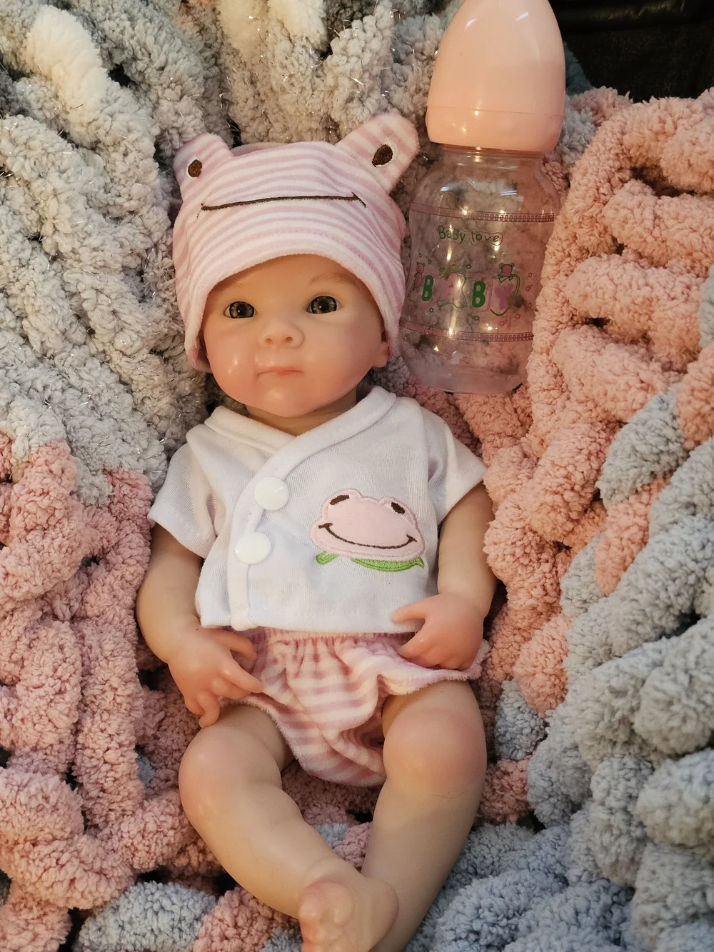 Reborn Pink and White Baby Doll with Frog Outfit
