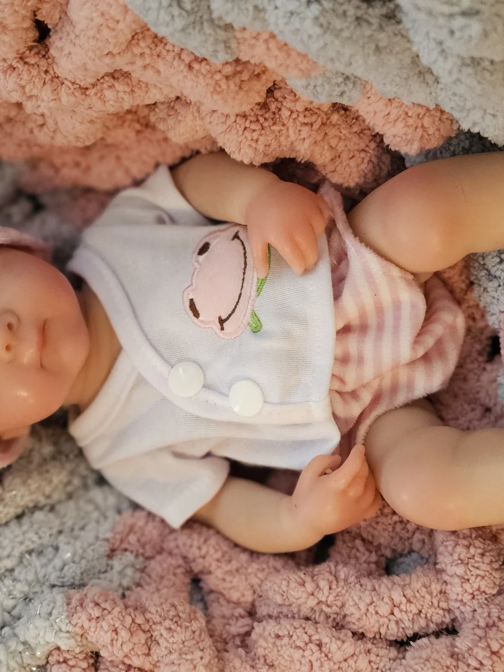 Reborn Pink and White Baby Doll with Frog Outfit