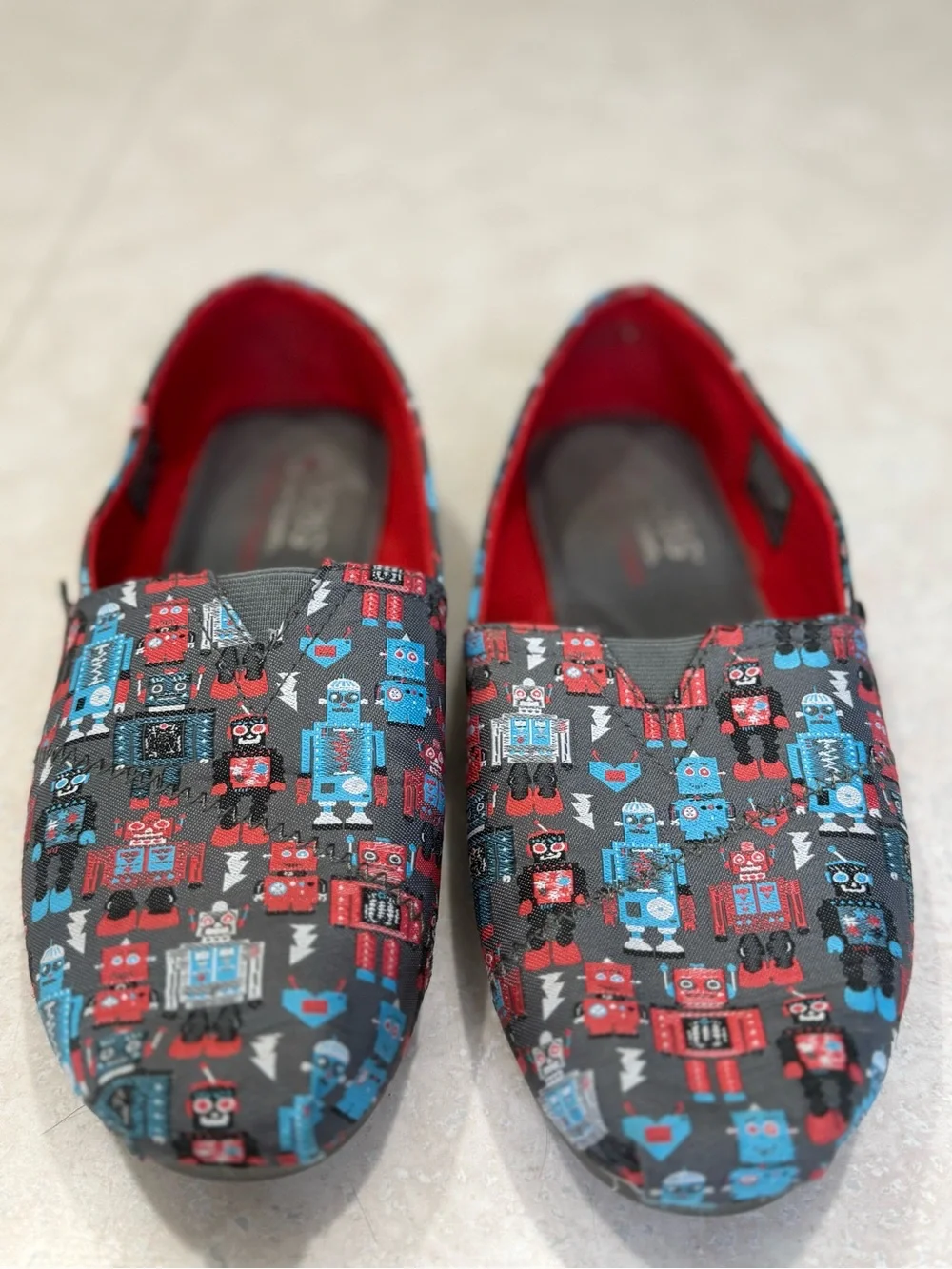 BOBS from Skechers Black Slip-On Loafers with Red & Blue Robot Print