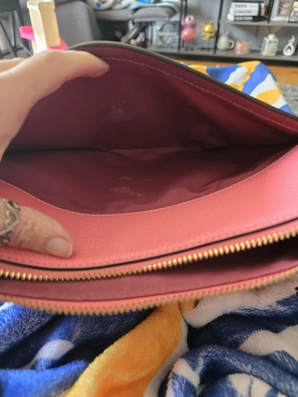 Coach includes snap design