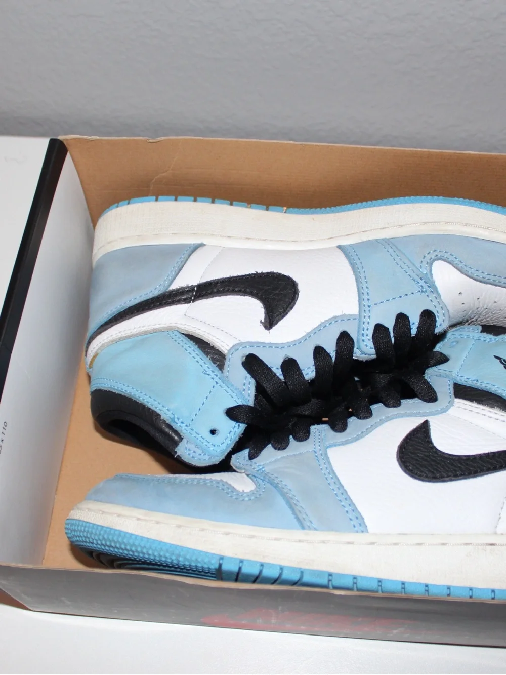 Nike Air Jordan 1 Low in White, Light Blue and Black