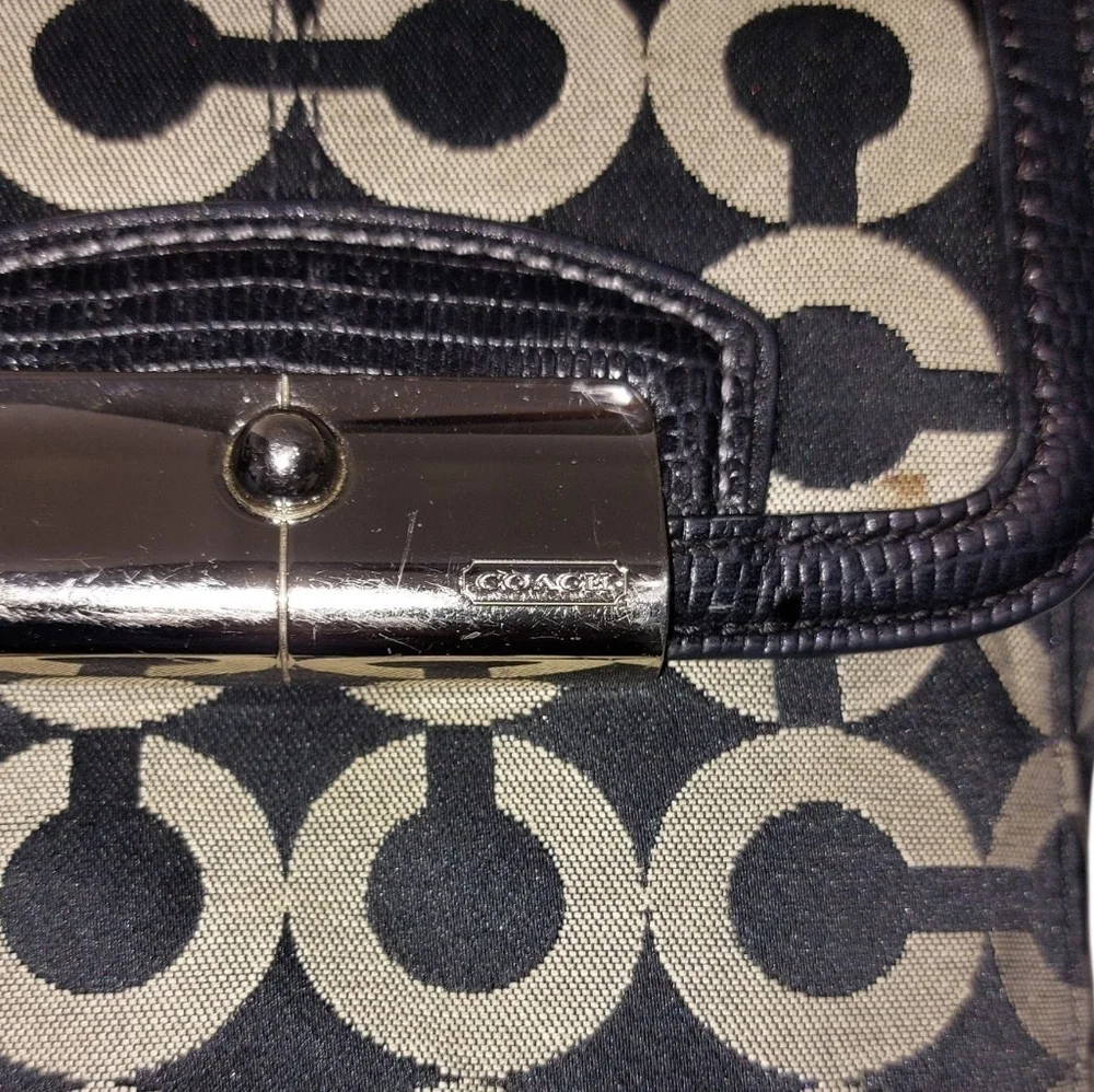 Coach sleek complemented