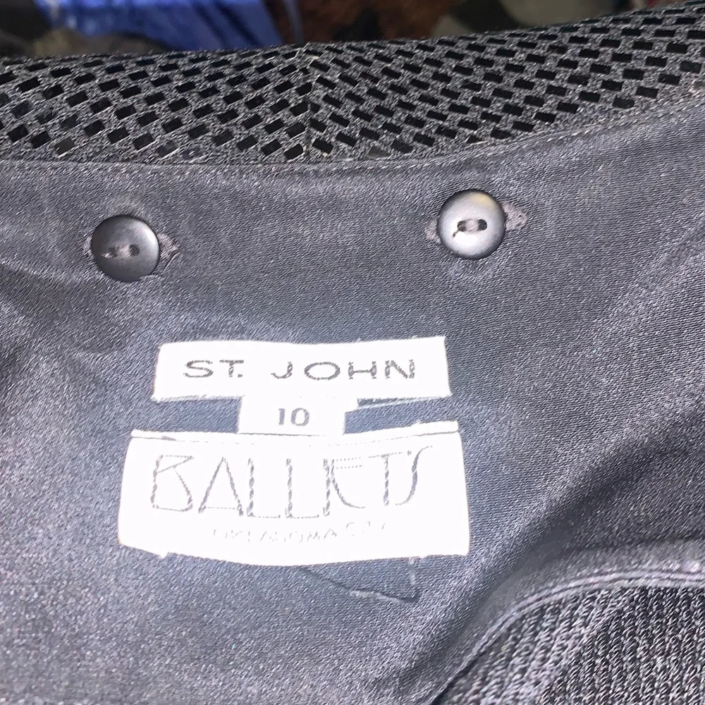 St. John examine multiple black