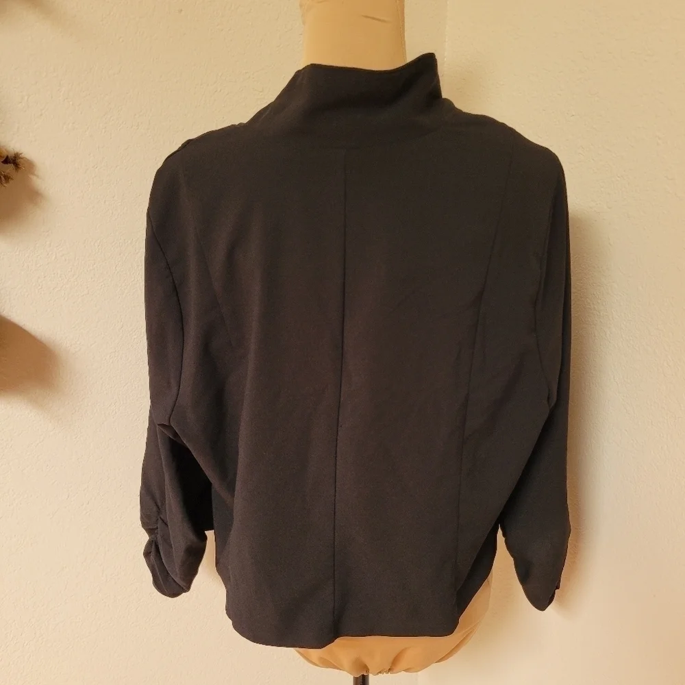 torrid black shrug