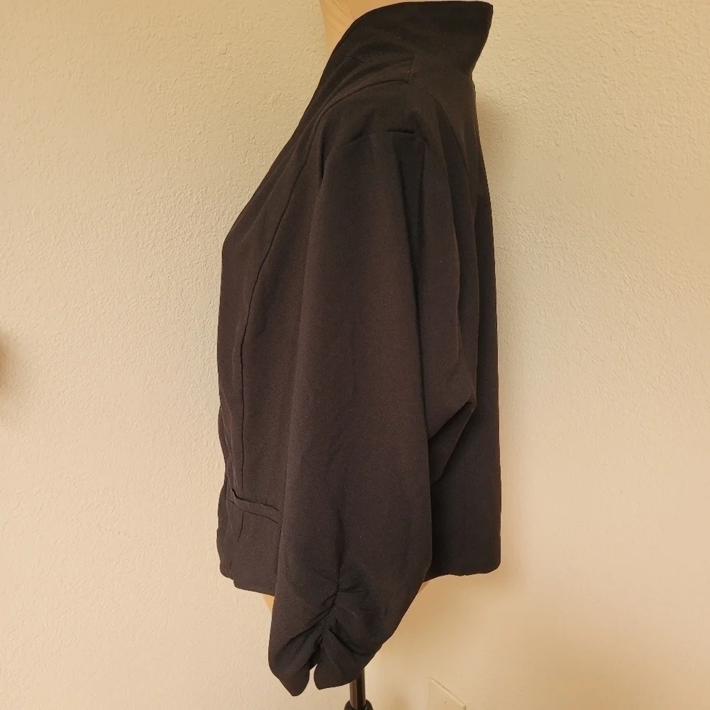 torrid black shrug