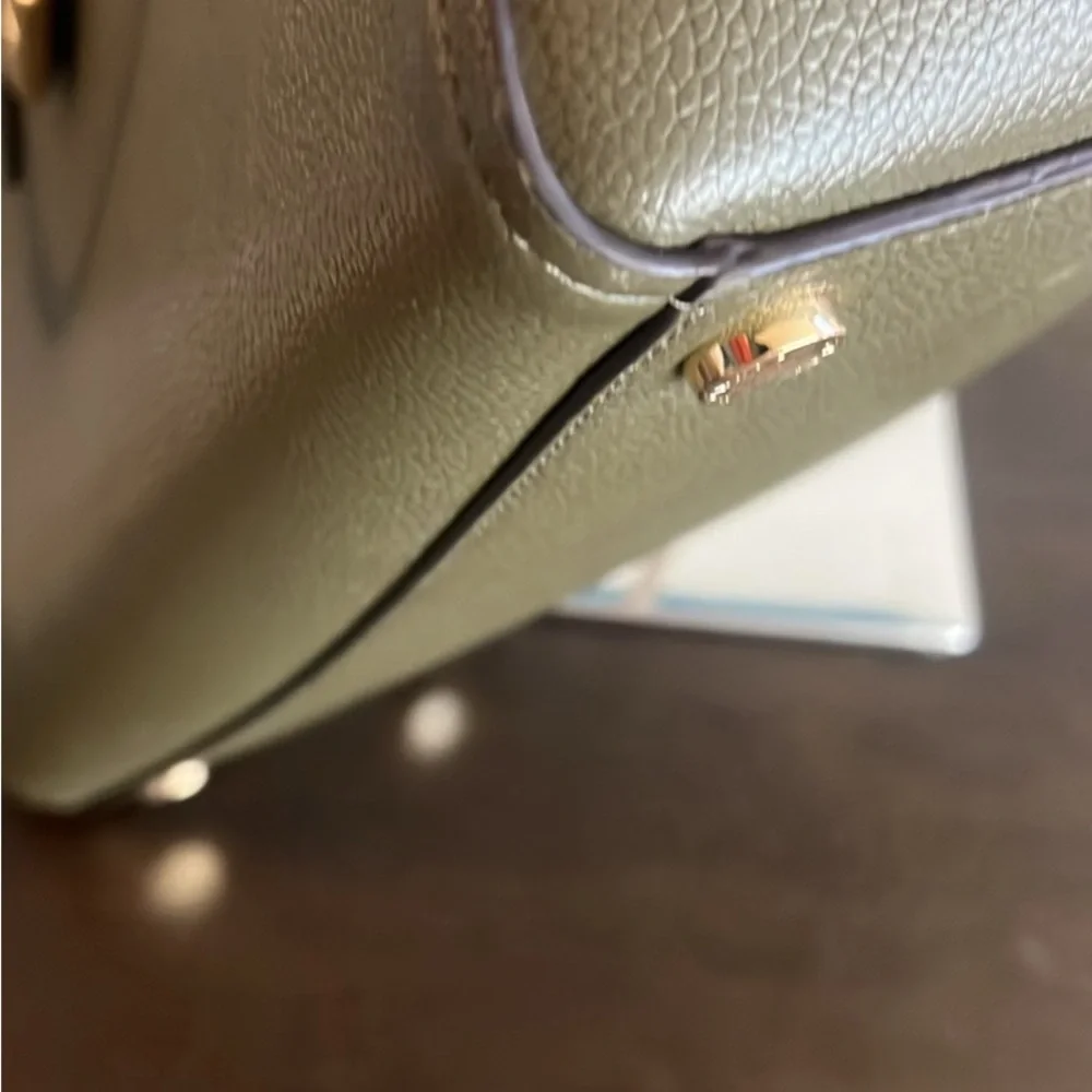 Michael Kors gold photo