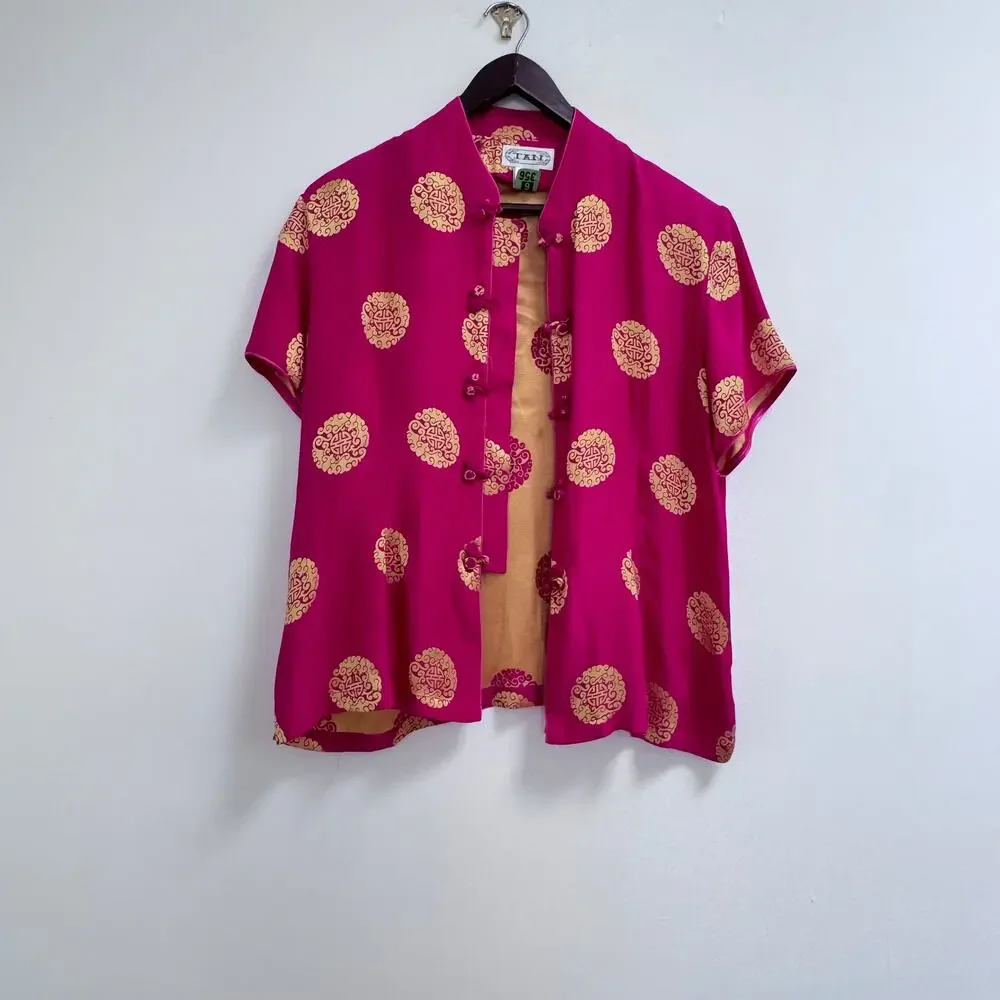 TAN magenta tang