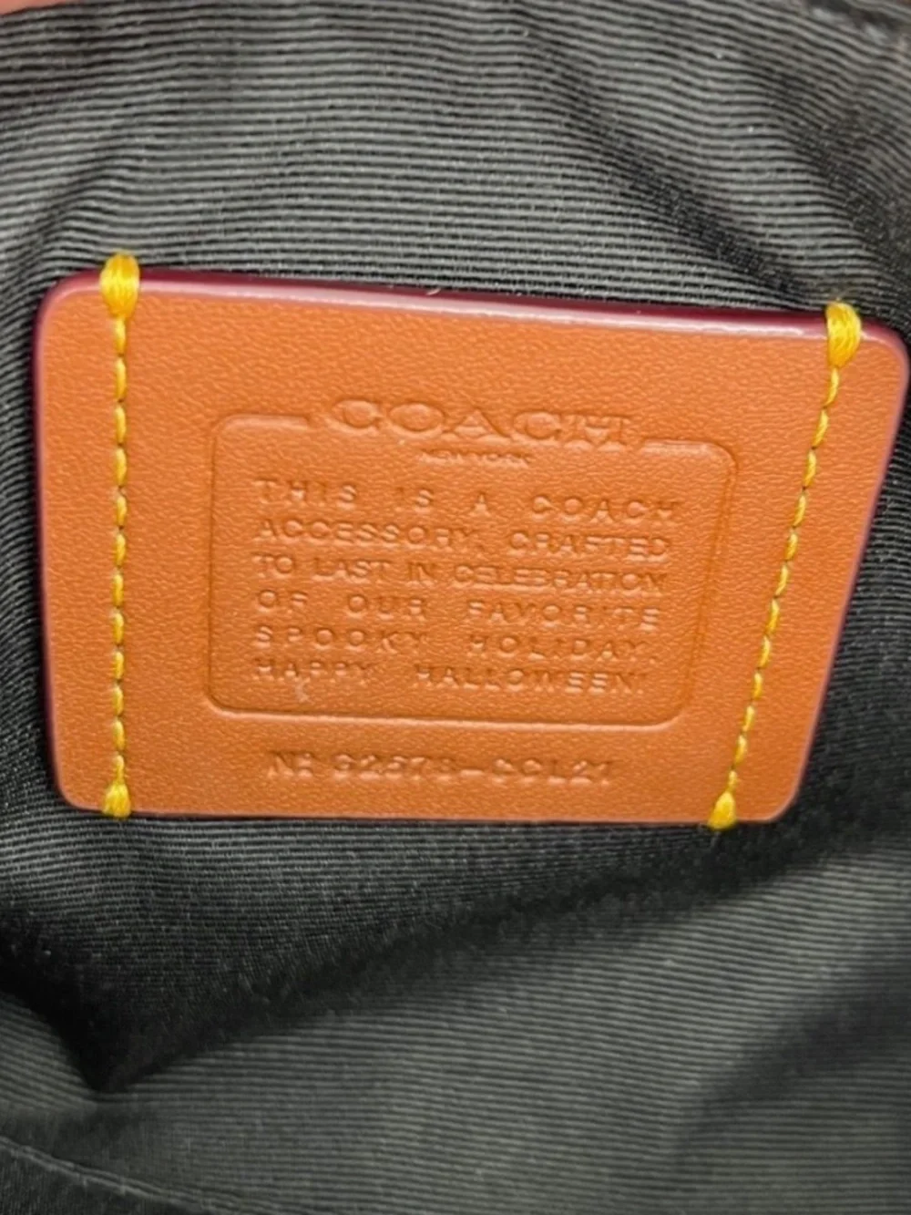 Coach signature coated
