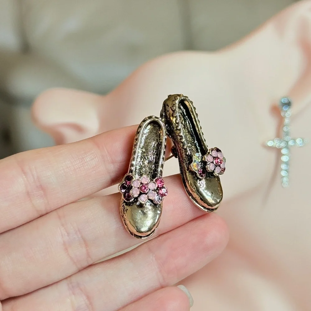 Anthropologie charming gold