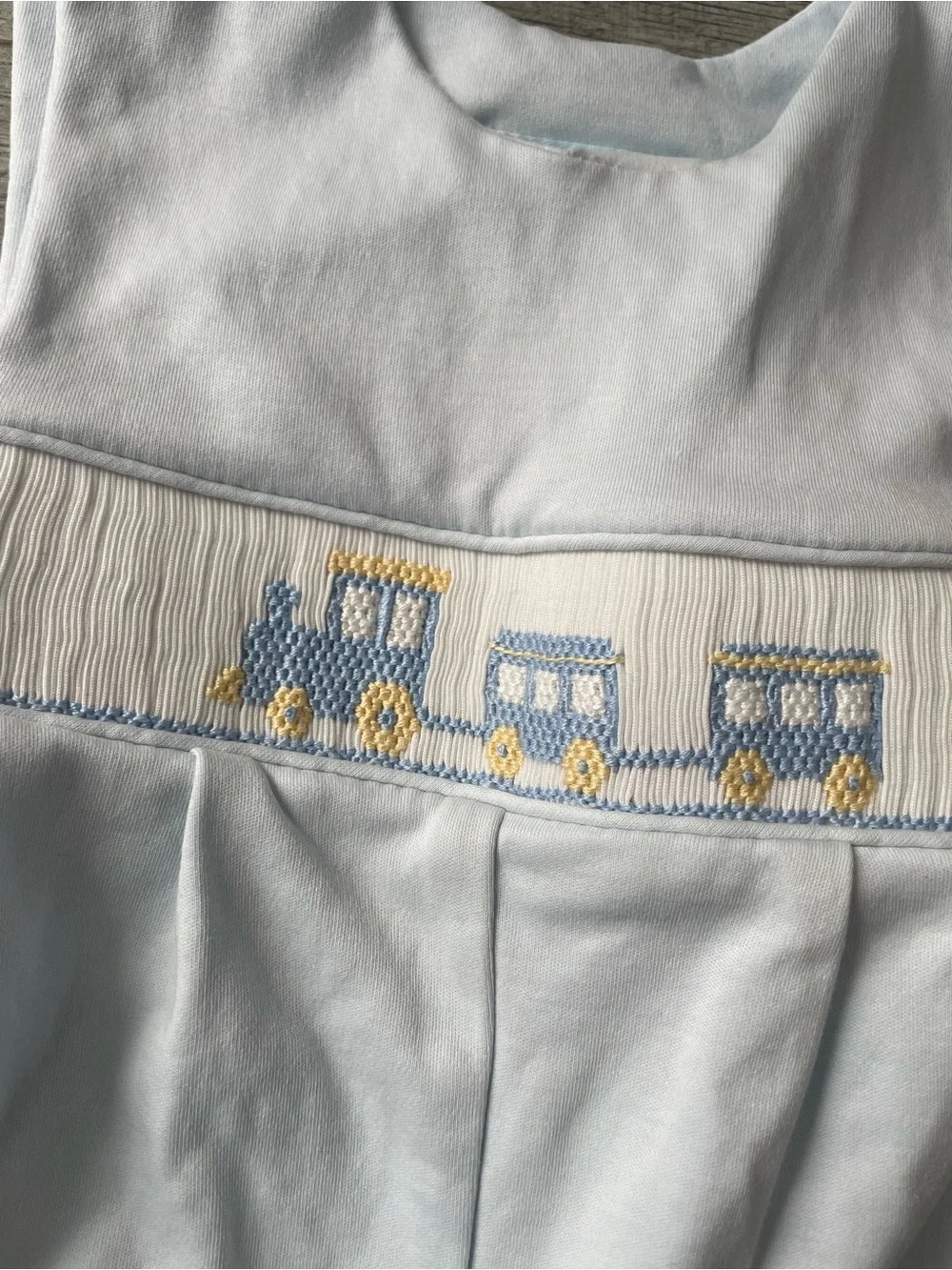 Petit Bebe Smocked Train Romper
