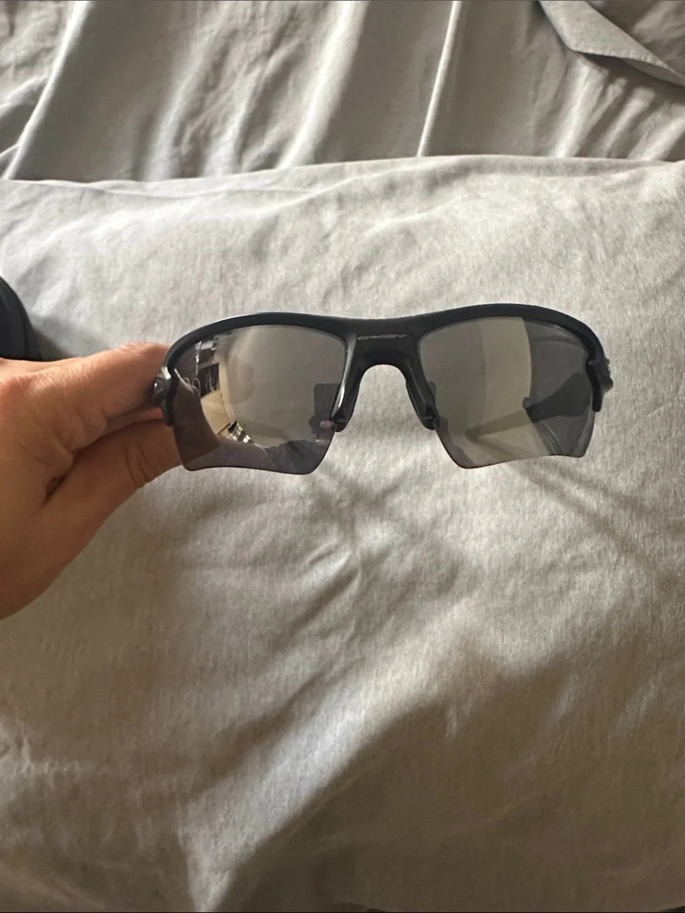 Oakley Black Frame Sunglasses with Gray Smoke Lenses