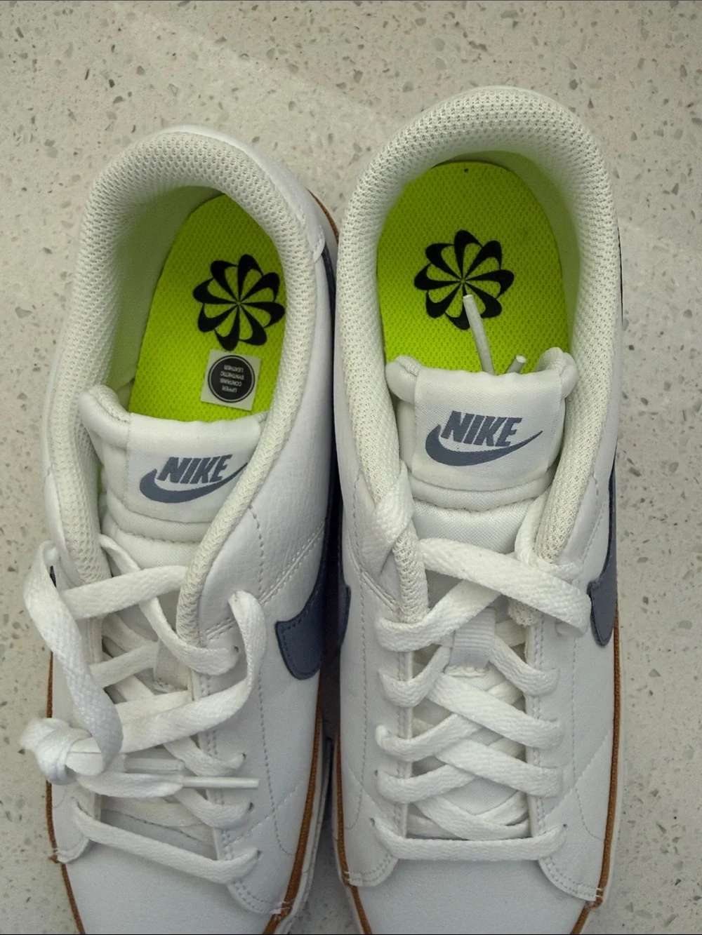 Nike Womens White Sneakers with Navy Swoosh and Tan Trim