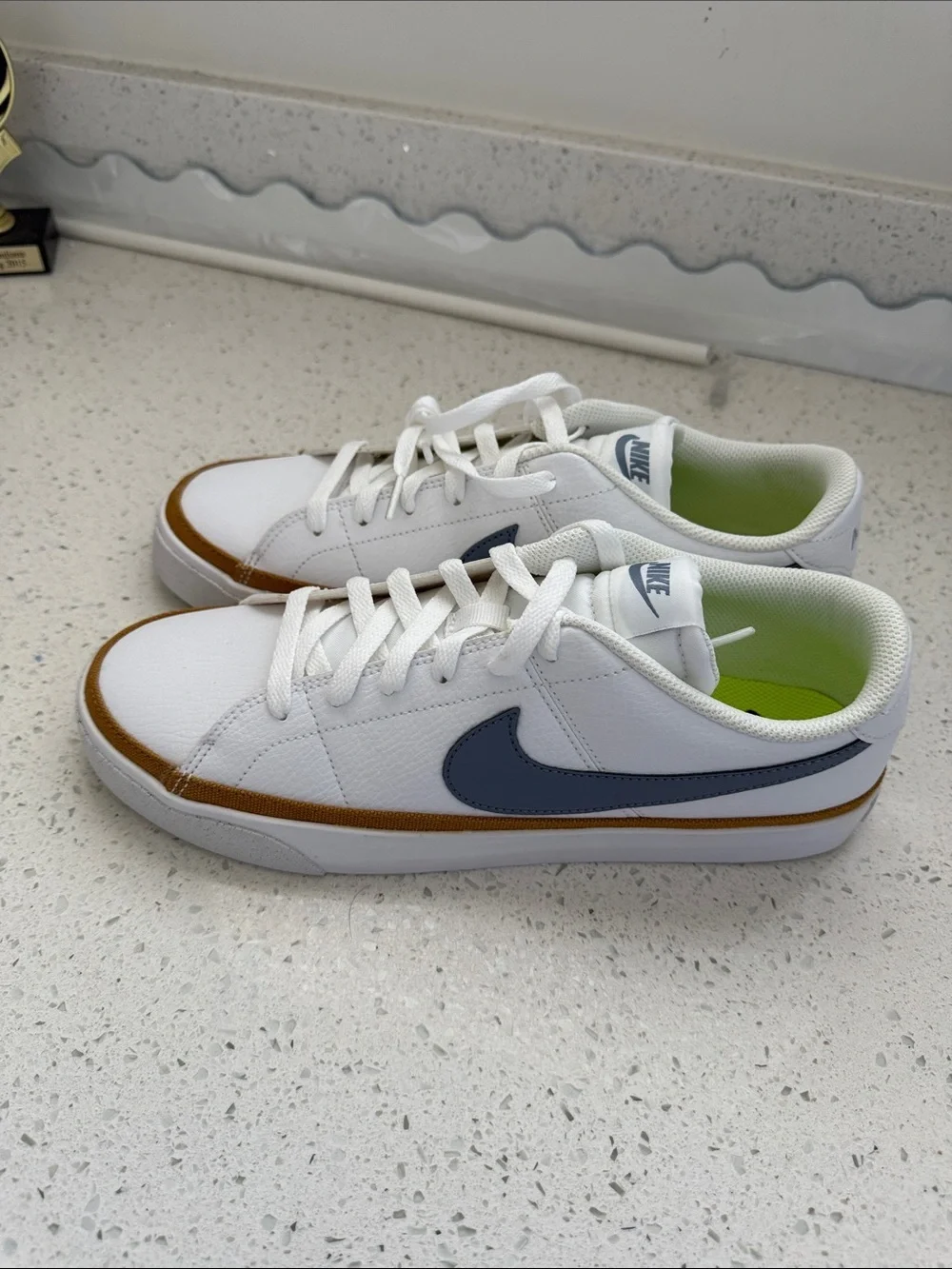 Nike Womens White Sneakers with Navy Swoosh and Tan Trim