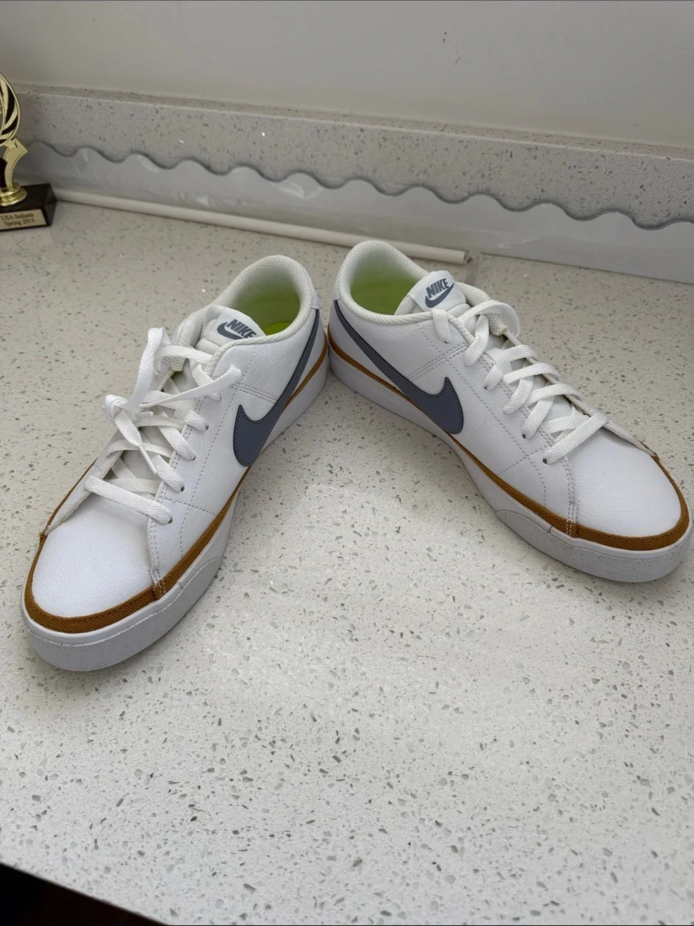 Nike Womens White Sneakers with Navy Swoosh and Tan Trim