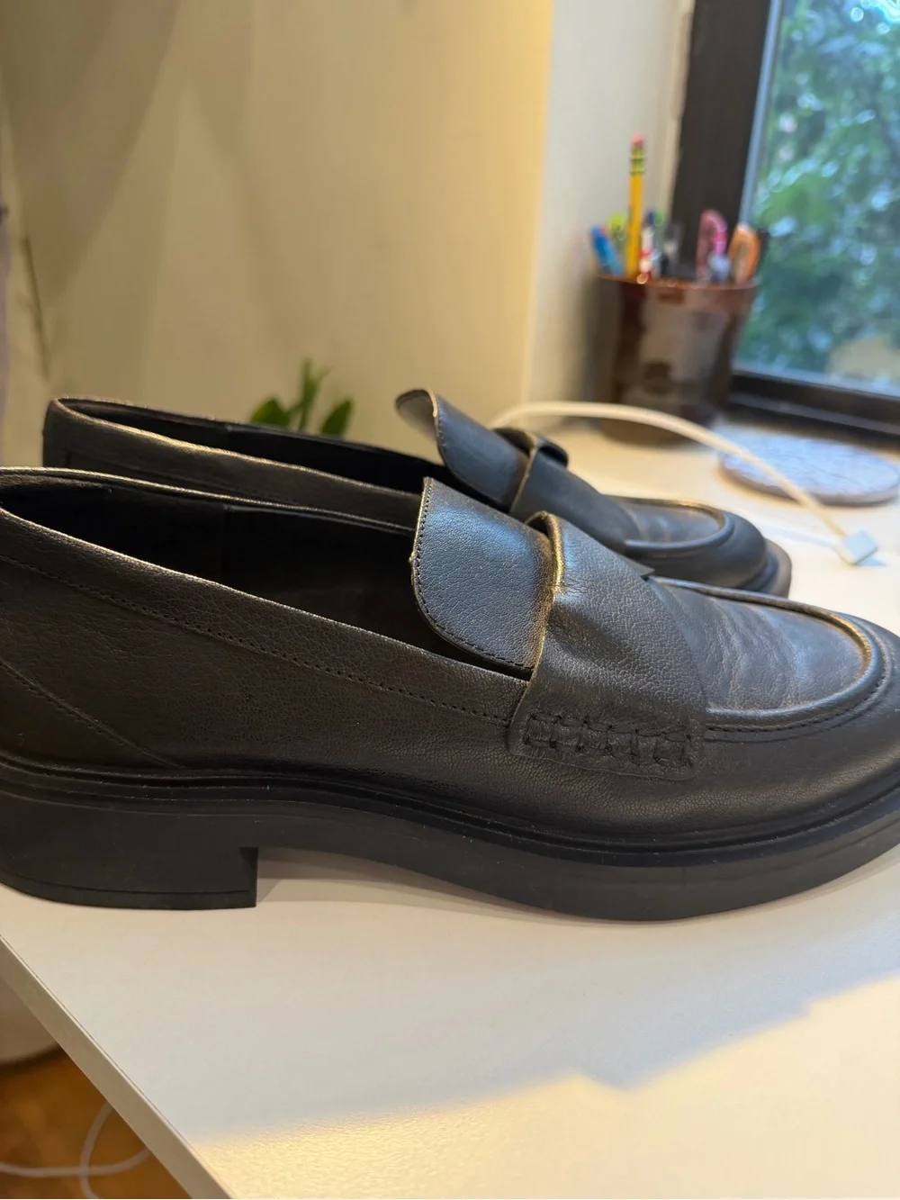 AEROSOLES features leather