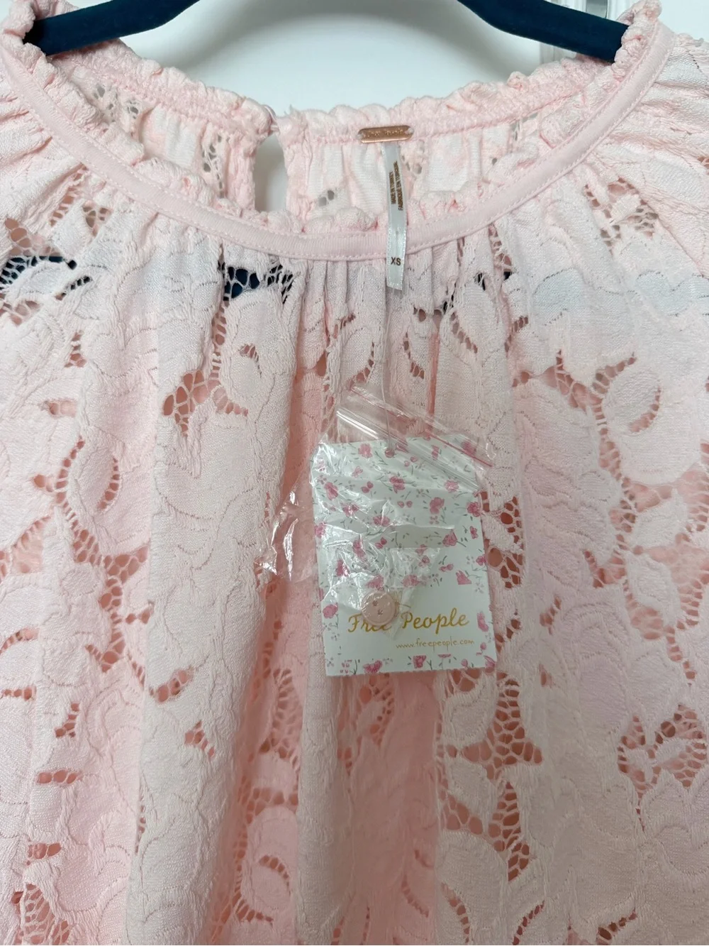 NWT Free People Olivia lace blouse is a romantic, blush pink top