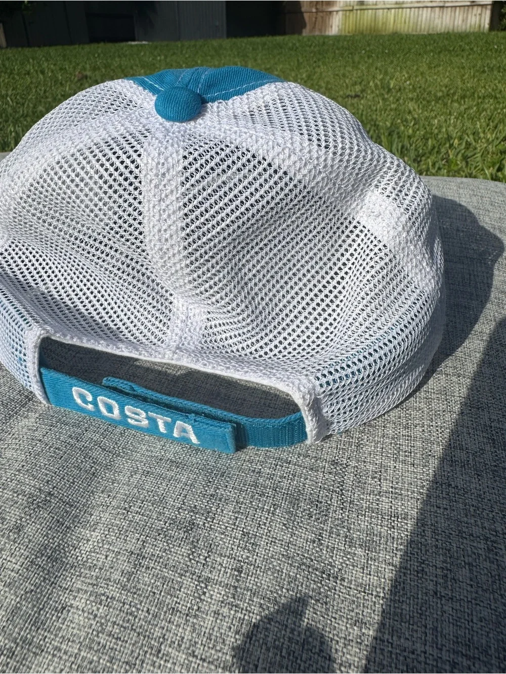 Costa branded trucker
