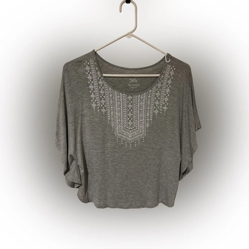 Beautiful Justice top with white decorative detail