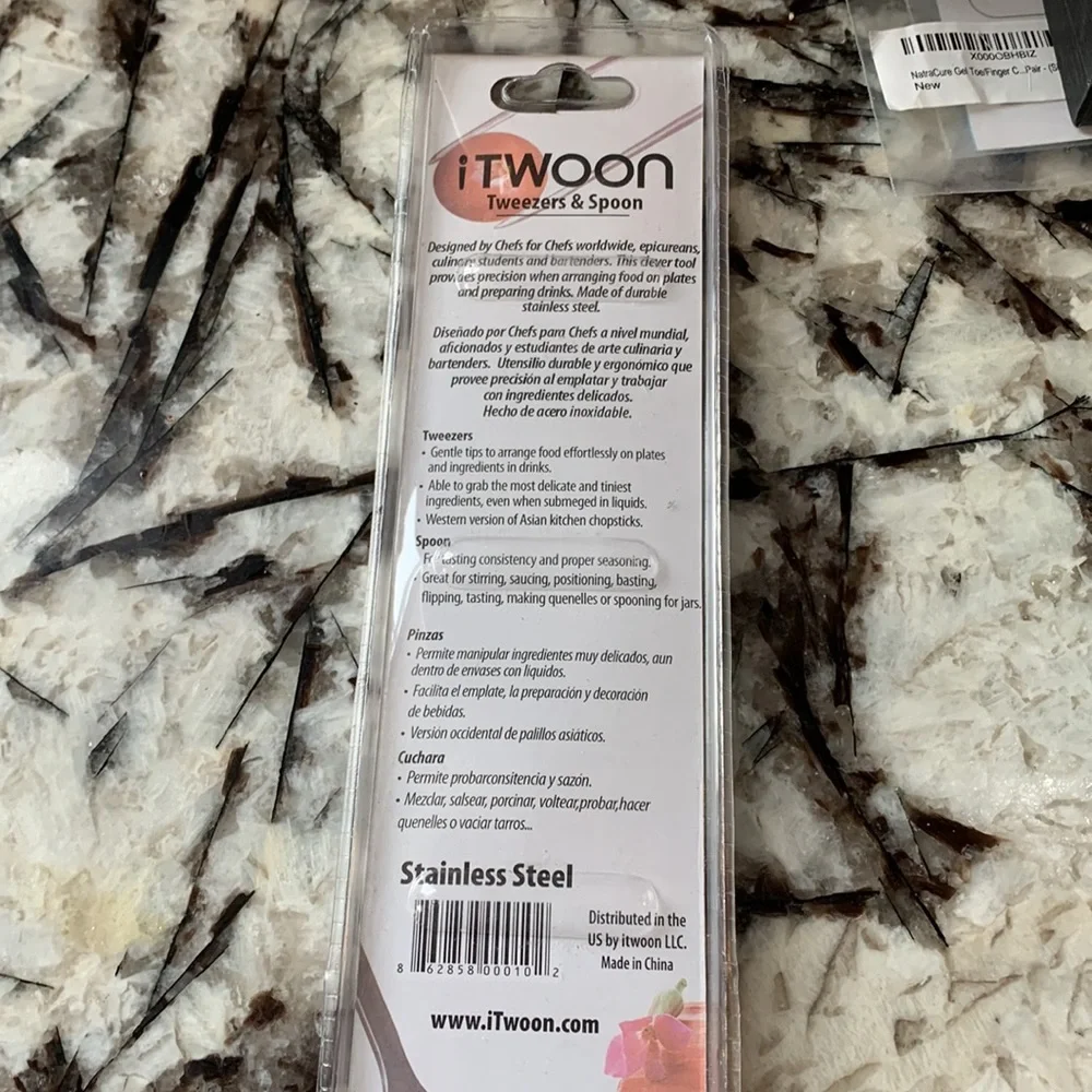 Itwoon tweezers and spoon.‎ New in package 22 retail