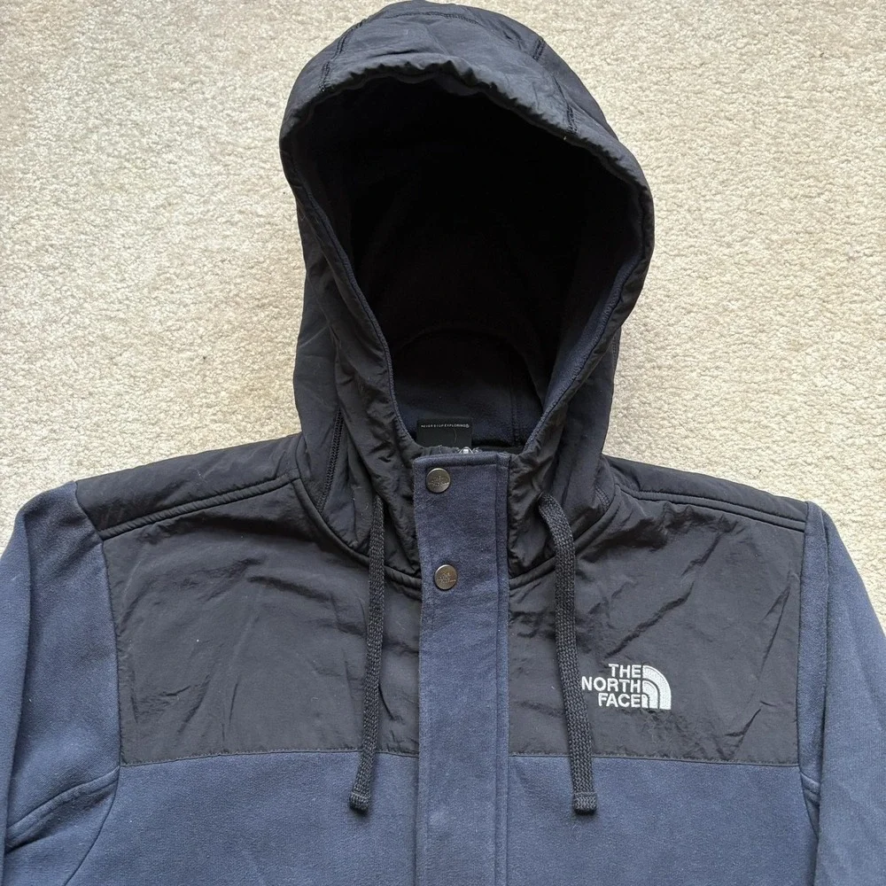The North Face medium tag