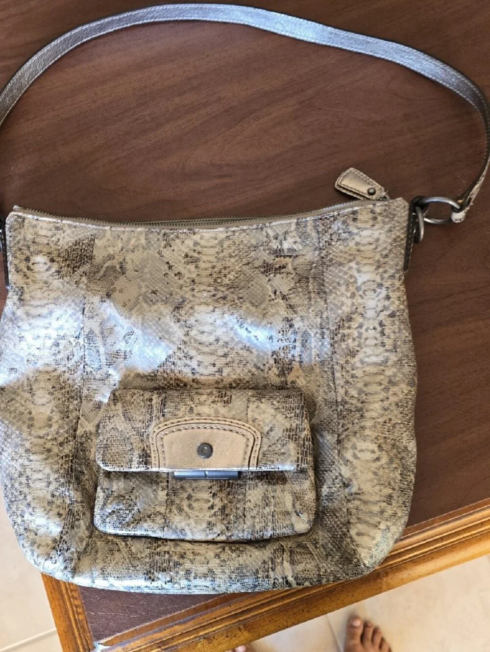 Coach sold sleek