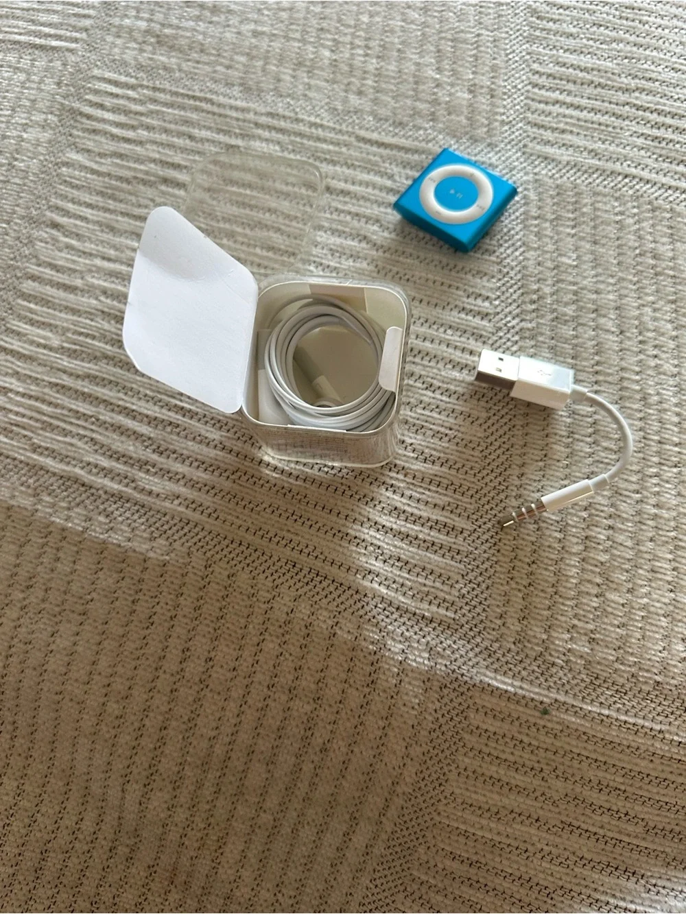 2gb Blue iPod Shuffle with Accessories- original packaging-never used.