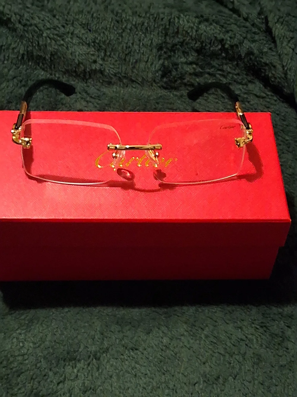 Rimless Gold and Black Eyeglasses