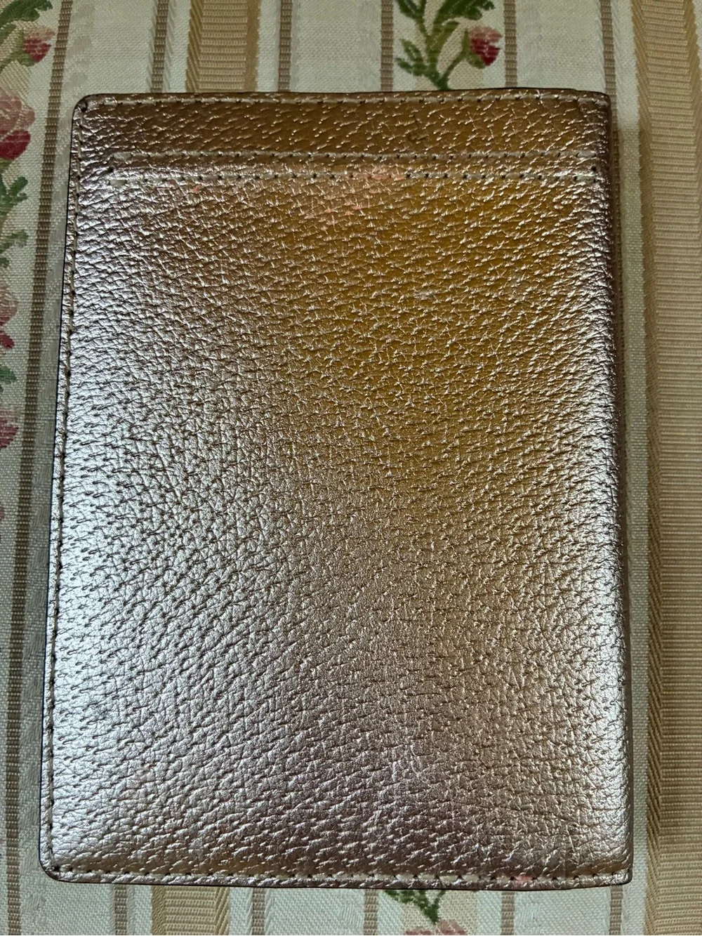 kate spade Metallic Rose Gold Pebbled Passport Cover