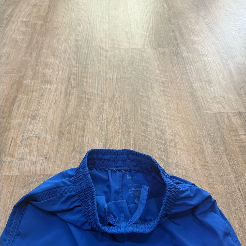 Nike Blue Performance Training Shorts with White Swoosh kids