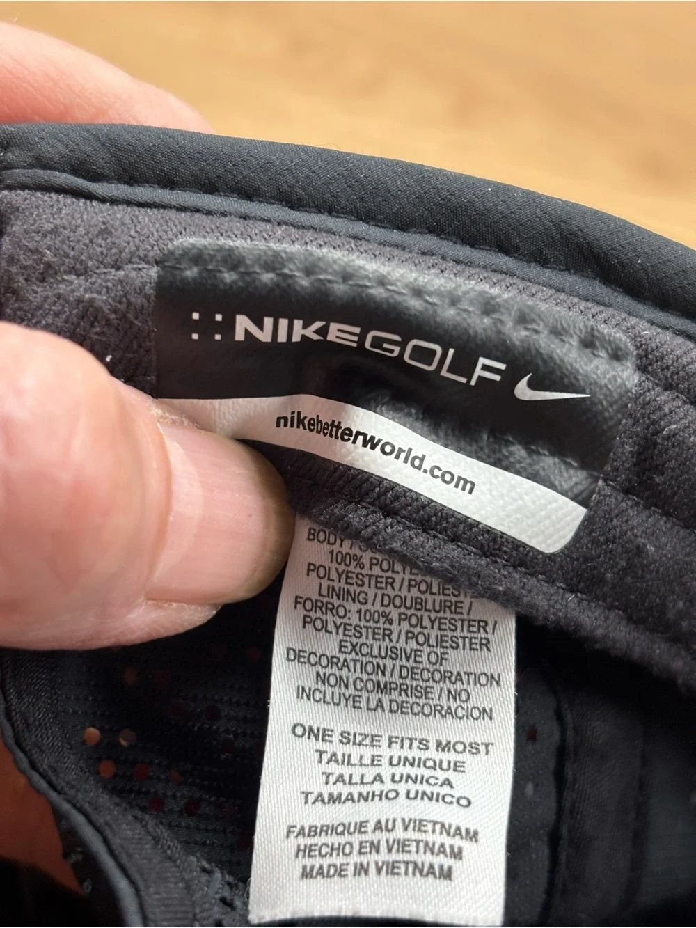 Nike Women's Perdorated Black Cap with White Swoosh